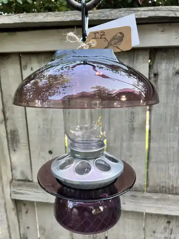 Vintage glass bird feeder