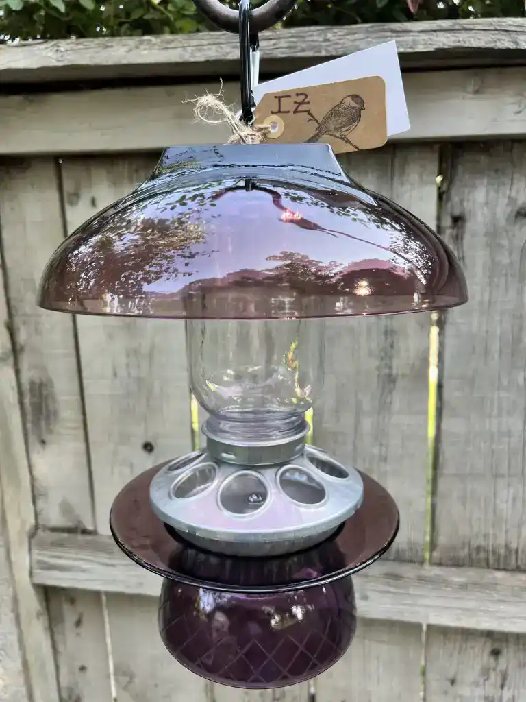 Vintage glass bird feeder