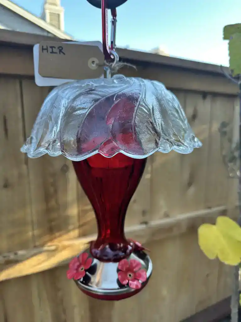 Vintage glass hummingbird feeder